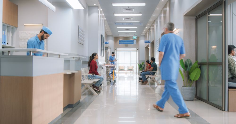 Establishing Shot of Active Local Indian Health Clinic Lobby, Representing Modern and Advanced Healthcare Services with Nurses and Doctors.