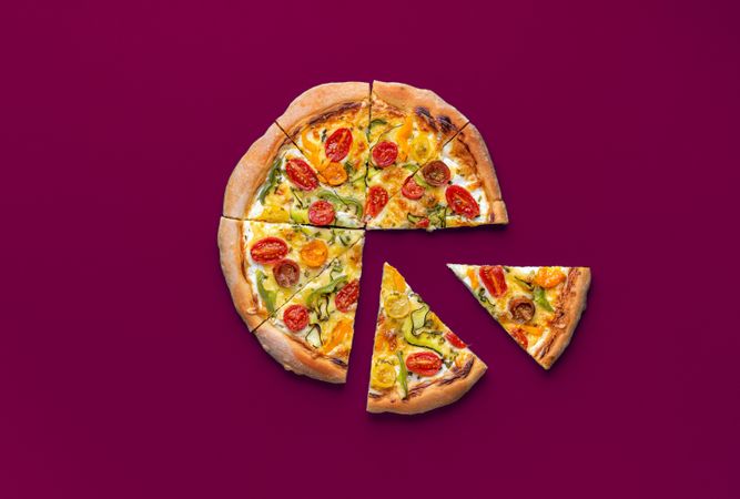 Vegetarian pizza top view on a magenta table