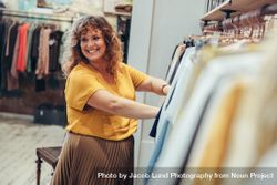 Stylish woman working in a clothing shop 4M9kl4