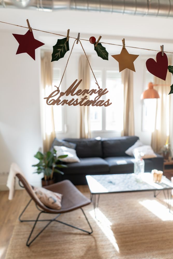 Light modern room decorated for Christmas