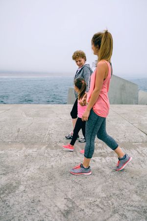Three female generations walking