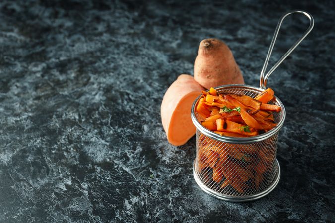 Concept of tasty food, fried sweet potato, space for text