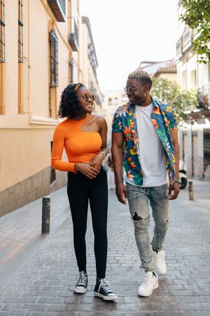 Young Black friends walking in the street