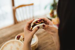 Woman holding Asian snack food