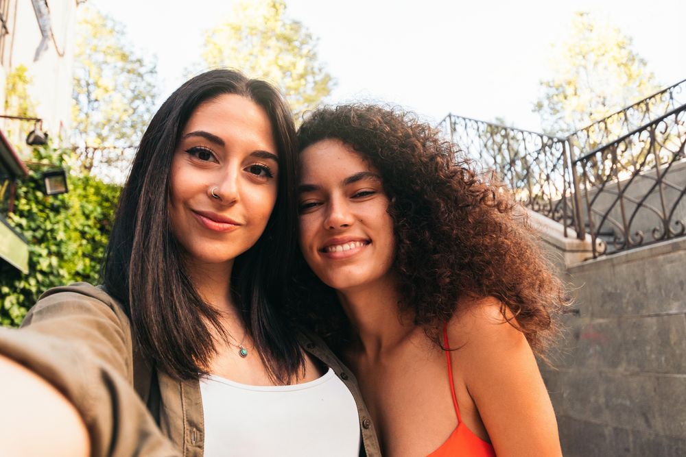 POV of stylish women couple's selfie