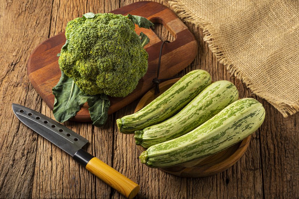 Zucchini and Broccoli on the table.