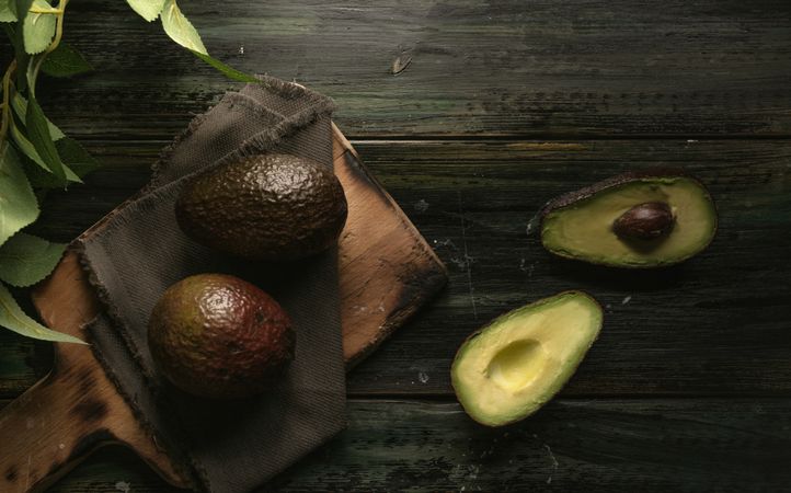 Set of freshly cut fresh avocados