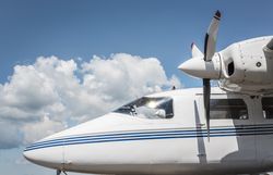 Private jet exterior against the blue sky