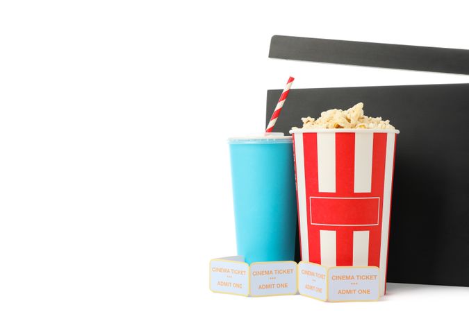 Clapperboard, paper cup, bucket with popcorn and tickets isolated