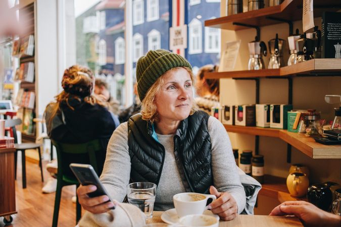 Woman in cosy cafe