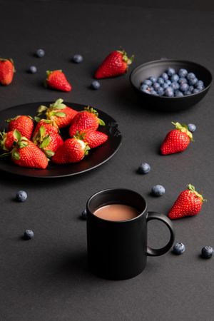 Fruits and hot beverage for breakfast