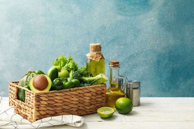 Concept of healthy food with vegetables and fruits on wooden table