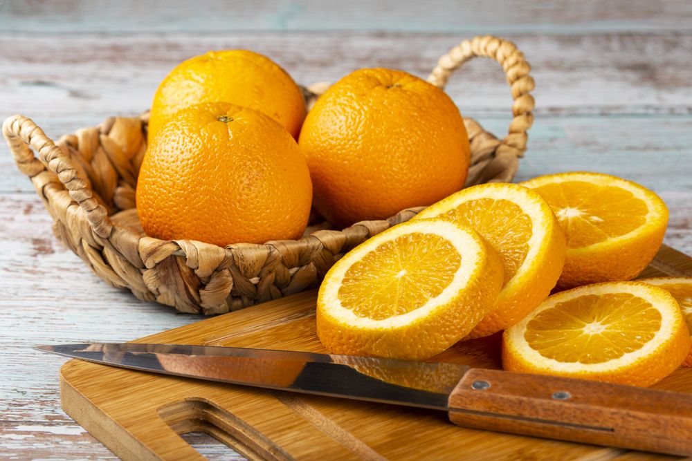 Sliced oranges on the table.