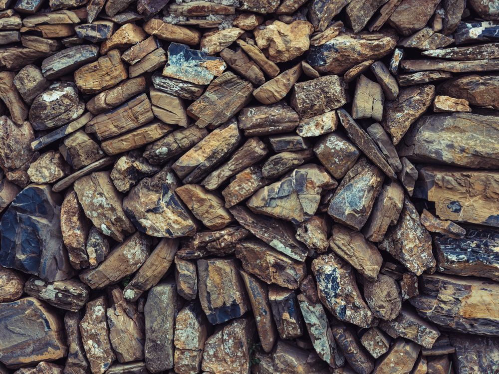 Heap of stones placed in stack for storage