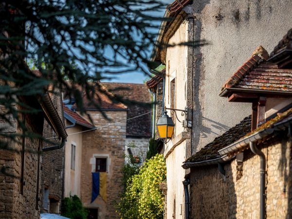 Medieval city of Chateauneuf in Burgundy. A cozy, cute town that grew up around a huge old castle.