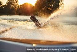 Man enjoying his summer on the lake water skiing 5Q7ygb