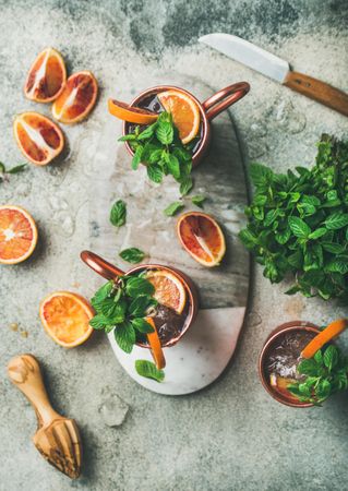 Fresh summer cocktail drink with citrus and herbs