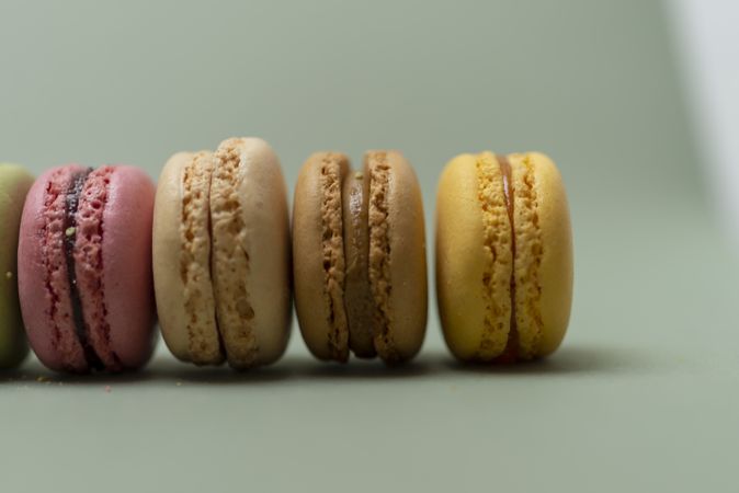 Colorful delicious macaroons lined on a table