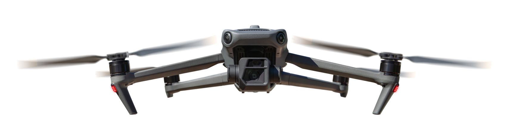 Front View of a Drone Quadcopter UAV In Flight Isolated on a Plain Background.
