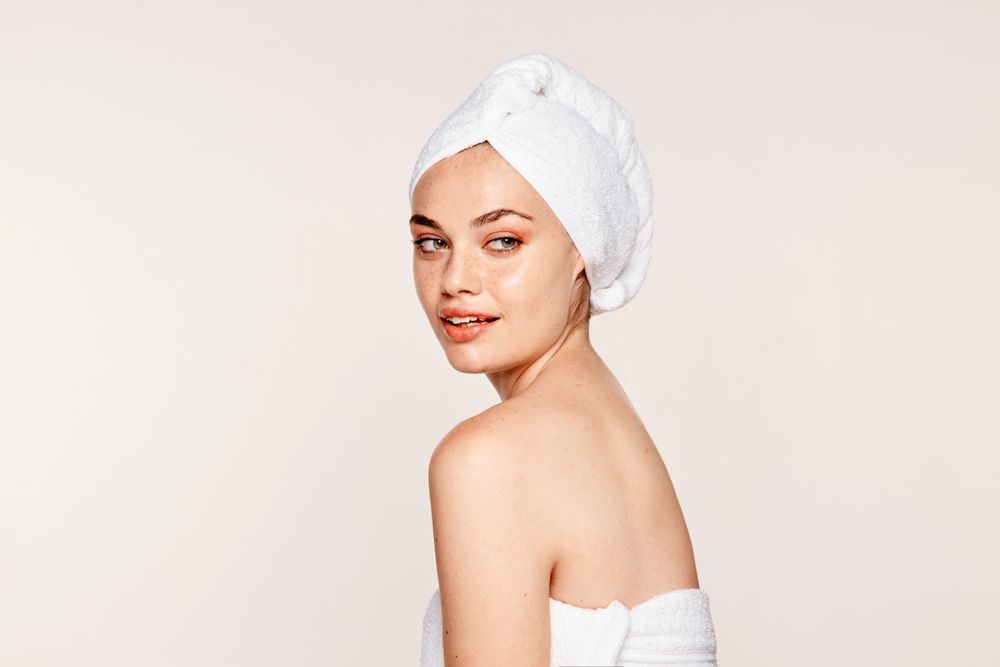 female with radiant body after cosmetic procedure