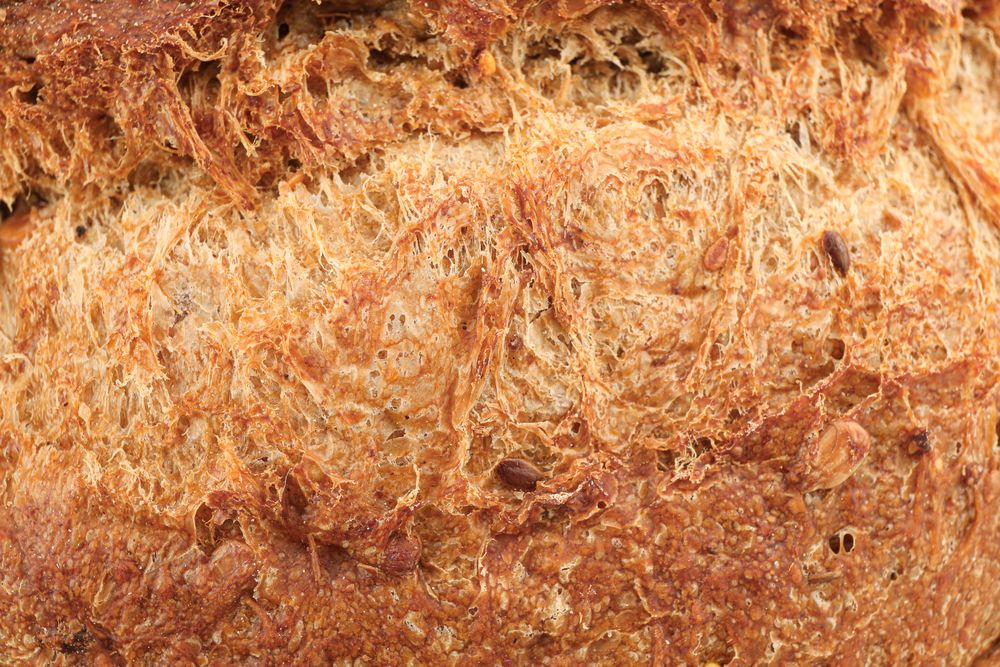 Wheat bread as background, closeup. Bakery products
