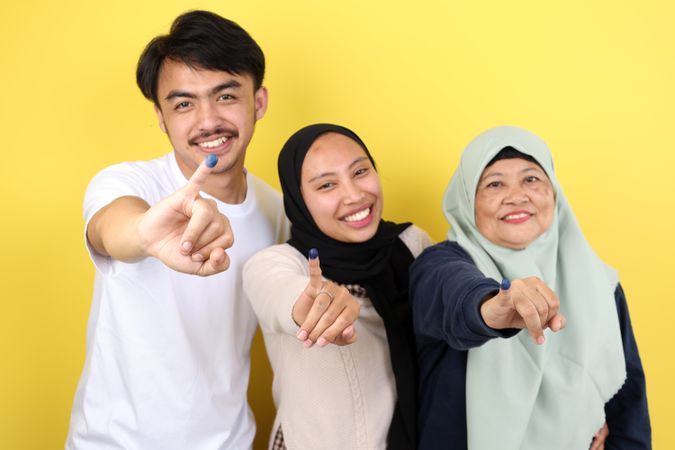Three People Indonesian Family Showed Tinta Pemilu, Inked Finger