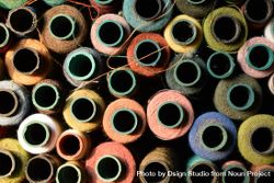 Pile of colorful spools for sewing machine 0gXYml