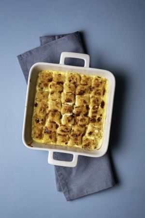 Gnocchi with cheese sauce in a tray