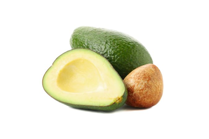 Ripe fresh avocado isolated on plain background