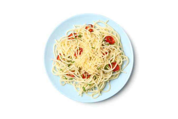 Plate with tasty pasta isolated on plain background
