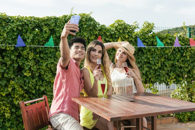 Group of friends drinking sangria on the terrace
