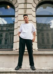 Stylish young man standing outside in London 0LKWyb