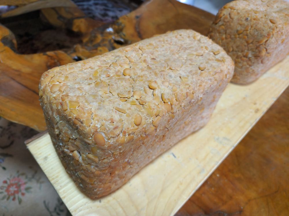 Boiling Yellow Soybeans in a Traditional Pot