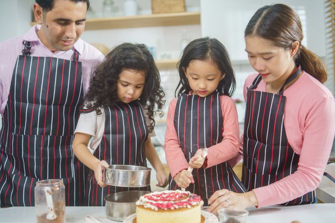 Family baking together in the kitchen