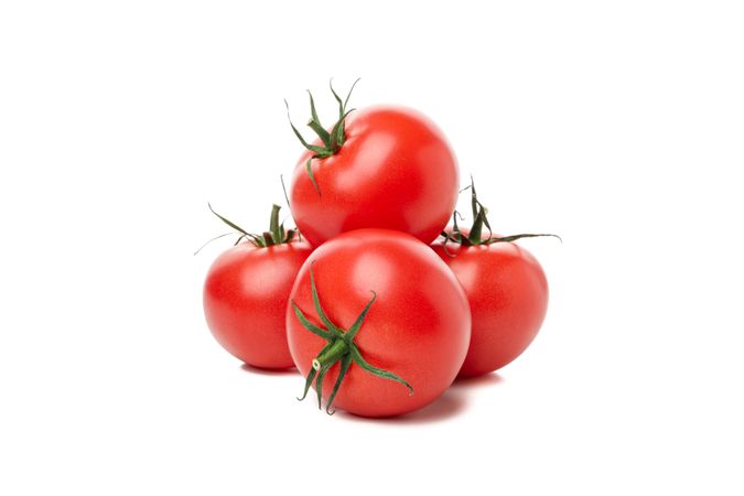 Fresh ripe tomatoes isolated on plain background
