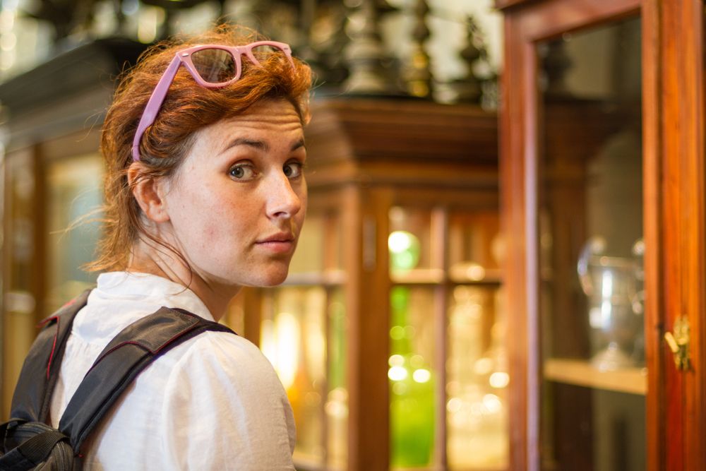 Female traveler in souvenir shop