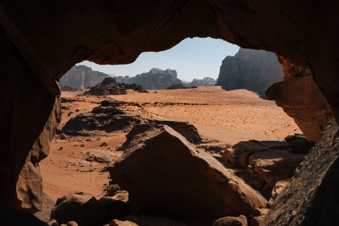 Sandy desert near cave entrance