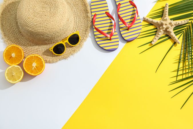 Summer vacation composition on two tone background. Space for text, top view
