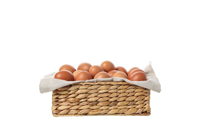 eggs in a square basket, isolated on blank background.