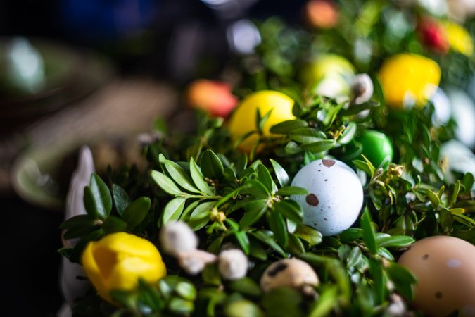 Close up of eggs nestled in lush centerpiece on table
