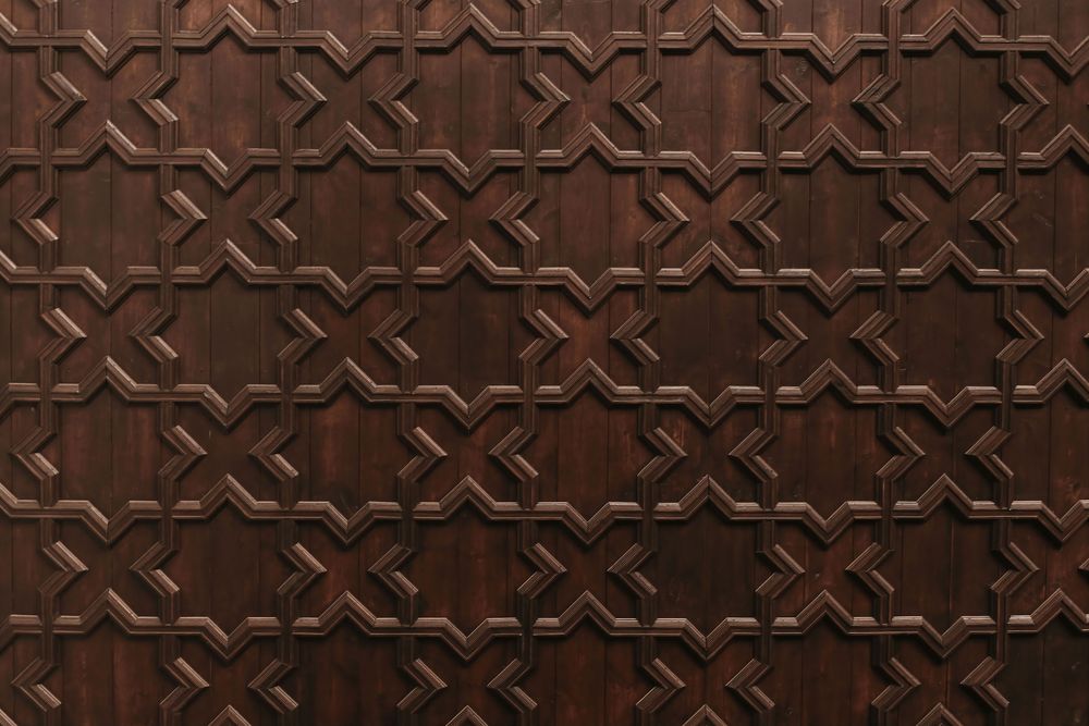 Decorative old wooden carved wall panelling, ceiling.