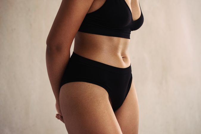Closeup of an anonymous natural female body wearing underwear