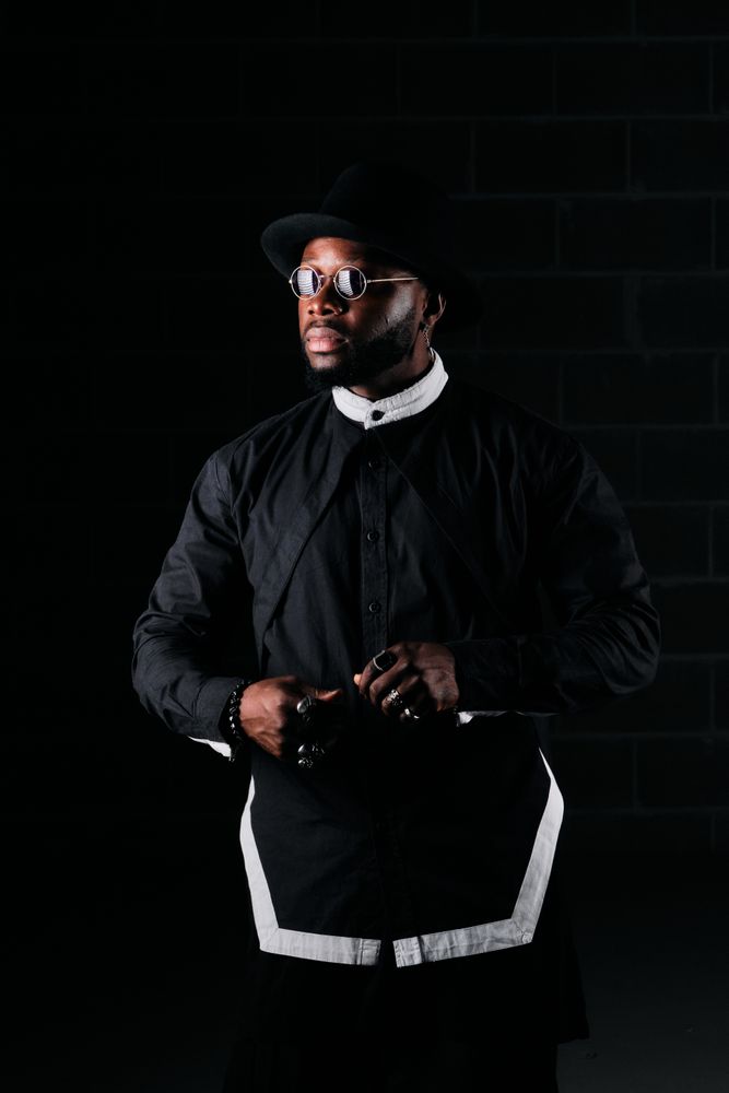 Black male model in stylish black attire