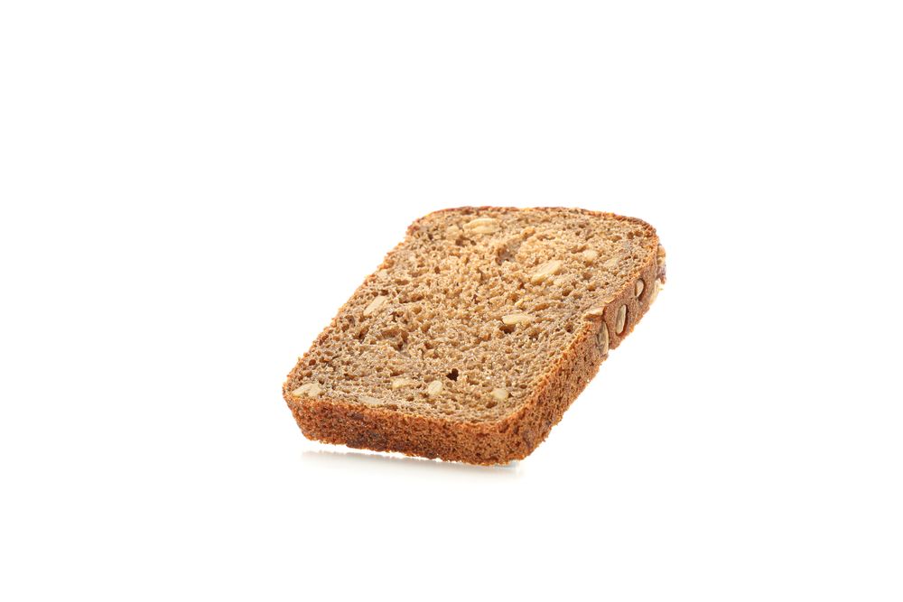Rye bread piece isolated on blank background. Bakery products