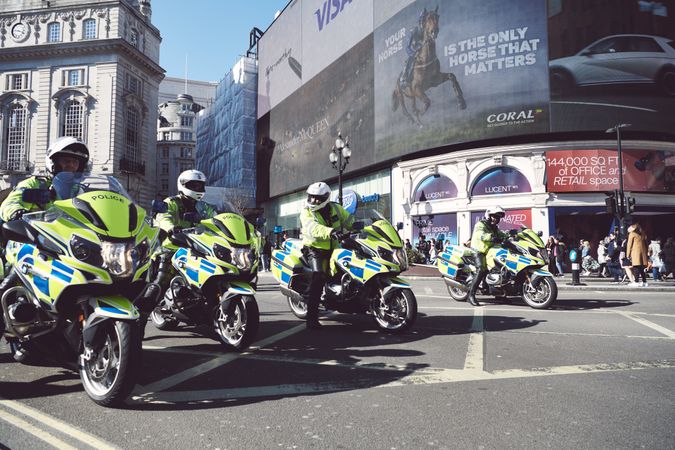 London, England, United Kingdom - March 19 2022: British police on motorcycles in Piccadilly Circus