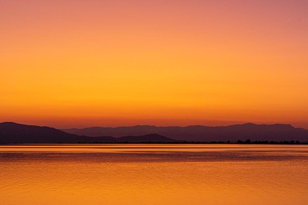 Sunset with reflections in the water