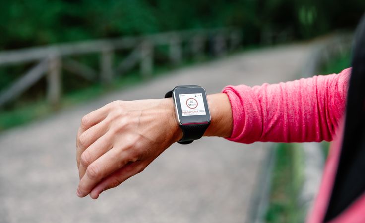 Athlete woman arm with smartwatch