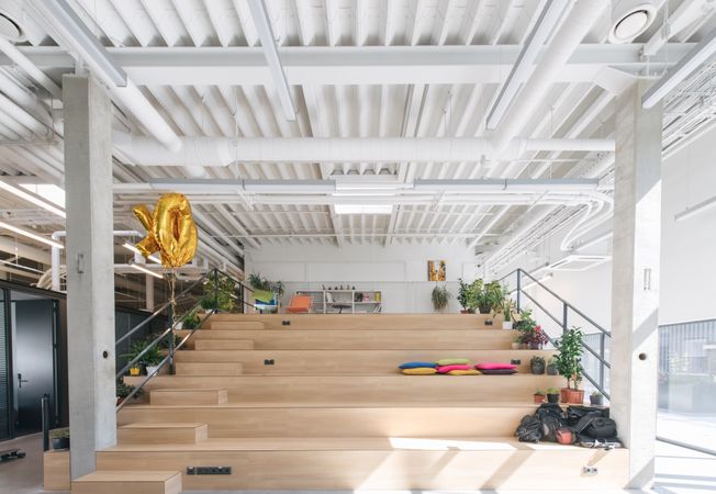Wooden steps in office interior for rest