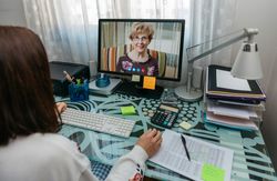 Woman talking on video call with her mother