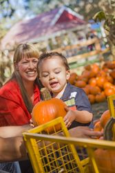 Happy Family at the Pumpkin Patch